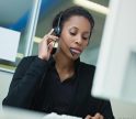 woman-in-black-shirt-wearing-call-center-headpiece-near-computer woman-in-black-shirt-wearing-call-center-headpiece-near-computer